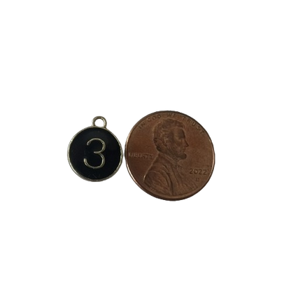 BLACK ROUND NUMBER CHARM (GOLD)